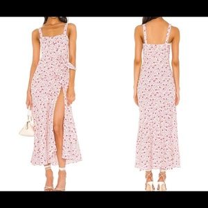 Never worn. Still tags on likely beautiful dress!!